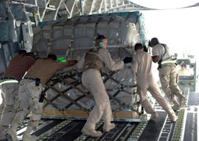 Military supplies being unloaded in Afghanistan.